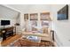 Cozy living room showcases hardwood floors, a comfortable sofa, and bright natural light at 285 Grove St, Charleston, SC 29403