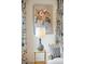 Decorated living room corner showcasing a lamp, floral painting, patterned curtains, and sofa with striped pillow at 285 Grove St, Charleston, SC 29403