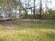 Spacious backyard with a swing set, offering a wonderful play area for children to enjoy at 315 King Charles Cir, Summerville, SC 29485