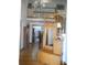 Inviting foyer with hardwood floors, staircase, and decorative furnishing pieces at 315 King Charles Cir, Summerville, SC 29485