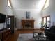 Bright living room with high ceilings, a decorative fireplace, and ample natural light at 315 King Charles Cir, Summerville, SC 29485