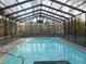Indoor pool area offers a serene swimming experience, featuring a view of the outdoors at 315 King Charles Cir, Summerville, SC 29485