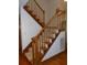 Carpeted staircase with wooden banister and posts leading to the upper level at 315 King Charles Cir, Summerville, SC 29485