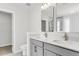 Bathroom featuring double sinks, a vanity, and a walk-in shower at 320 Abercom Place Dr, Moncks Corner, SC 29461
