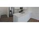 Modern kitchen featuring stainless appliances, white cabinets, and stone countertops at 320 Abercom Place Dr, Moncks Corner, SC 29461