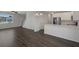 Bright and open floor plan with eat in kitchen featuring wood floors at 320 Abercom Place Dr, Moncks Corner, SC 29461