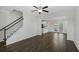 Bright and open living room with wood floors and a staircase at 320 Abercom Place Dr, Moncks Corner, SC 29461