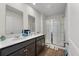 Bright bathroom with double sinks, and a glass enclosed shower at 324 Spruce Ivy St, Moncks Corner, SC 29461