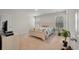 Bright bedroom with natural light, simple decor, and carpeted flooring at 324 Spruce Ivy St, Moncks Corner, SC 29461
