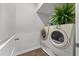 Functional laundry area with washer, dryer, and storage space at 324 Spruce Ivy St, Moncks Corner, SC 29461
