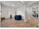Cozy living room boasts wood-look flooring, and bright airy space at 324 Spruce Ivy St, Moncks Corner, SC 29461