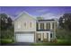 Inviting two-story home featuring a two-car garage and charming curb appeal at 336 Dickerson Ln, Lincolnville, SC 29485