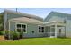 Charming home exterior features lush lawn and screened porch for outdoor relaxation at 336 Dickerson Ln, Summerville, SC 29485