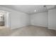 Spacious bedroom boasts neutral carpet, ample natural light, and convenient access to bathroom at 336 Dickerson Ln, Summerville, SC 29485