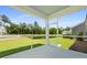 Inviting screened porch with scenic views of lush backyard and serene pond at 336 Dickerson Ln, Summerville, SC 29485