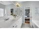 Bright bathroom with double sink vanity and view into the main bedroom at 366 Clayton Dr, Charleston, SC 29414