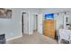 A light blue bedroom featuring a TV on top of a wooden dresser and two closets at 366 Clayton Dr, Charleston, SC 29414