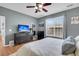 Comfortable bedroom with a view, featuring a dresser, TV, and natural light at 366 Clayton Dr, Charleston, SC 29414