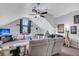 Spacious bonus room with a large TV, basketball hoop, seating, and neutral colors at 366 Clayton Dr, Charleston, SC 29414