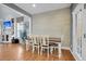 Inviting dining room featuring stylish wood floors, bright white trim, and lots of natural light at 366 Clayton Dr, Charleston, SC 29414