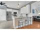 Well-lit kitchen featuring bright white cabinets and stainless steel appliances at 366 Clayton Dr, Charleston, SC 29414