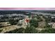 Panoramic aerial view showcasing a beautiful neighborhood with lush greenery, and marsh views in the distance at 3864 Summerton St, Mount Pleasant, SC 29466