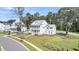 Aerial view of a beautifully landscaped home with a manicured lawn and charming neighborhood setting at 3864 Summerton St, Mount Pleasant, SC 29466