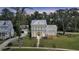 Stunning aerial view of a two-story home with a detached garage and a well-maintained front lawn at 3864 Summerton St, Mount Pleasant, SC 29466