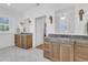 Dual vanities with marble countertops and wood cabinets in a bright bathroom at 3864 Summerton St, Mount Pleasant, SC 29466