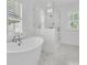 Modern bathroom featuring a soaking tub and glass enclosed shower at 3864 Summerton St, Mount Pleasant, SC 29466