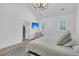 Spacious bedroom with vaulted ceilings, two windows, television and neutral decor at 3864 Summerton St, Mount Pleasant, SC 29466