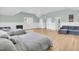 Well-lit bedroom with vaulted ceiling, comfortable seating, and two beds for guests at 3864 Summerton St, Mount Pleasant, SC 29466