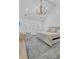 Bedroom with chandelier, hardwood flooring, accent rug and sitting chair at 3864 Summerton St, Mount Pleasant, SC 29466
