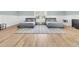 Spacious bedroom with two beds, soft lighting and hardwood floors, offering a comfortable atmosphere at 3864 Summerton St, Mount Pleasant, SC 29466
