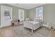 Green tone bedroom featuring neutral rug and light tone hardwood flooring at 3864 Summerton St, Mount Pleasant, SC 29466