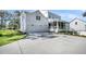 The house has a three car garage with a vast concrete driveway and a charming screened in porch at 3864 Summerton St, Mount Pleasant, SC 29466