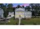 Stunning two-story home with a metal roof and a detached garage, perfect for luxury living at 3864 Summerton St, Mount Pleasant, SC 29466