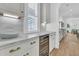 Gourmet kitchen with marble countertops, stainless steel appliances, and a wine refrigerator at 3864 Summerton St, Mount Pleasant, SC 29466