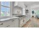 Elegant kitchen featuring a professional range, marble countertops and bright lighting at 3864 Summerton St, Mount Pleasant, SC 29466