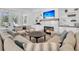 Bright living room with a fireplace, comfortable seating and a view to the outdoors at 3864 Summerton St, Mount Pleasant, SC 29466