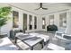 Covered outdoor seating area with stylish furniture, ideal for relaxing and enjoying the scenery at 3864 Summerton St, Mount Pleasant, SC 29466