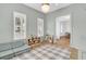 Bright and airy playroom with hardwood floors, a cozy couch, and natural light at 3864 Summerton St, Mount Pleasant, SC 29466