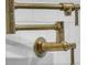 Close-up of a brass pot filler over a white subway tile backsplash at 3864 Summerton St, Mount Pleasant, SC 29466