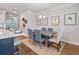 Bright dining area featuring a wooden table, upholstered chairs, and tasteful decor at 408 Katies Scenic Ct, Charleston, SC 29492