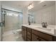 Bathroom featuring double vanity, sleek lighting, and a glass-enclosed shower at 410 Katies Scenic Ct, Charleston, SC 29492