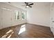 Bright bedroom with hardwood floors, large windows, and ceiling fan at 410 Katies Scenic Ct, Charleston, SC 29492