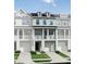 Charming two-story townhouse with a porch, garage, and manicured lawn at 414 Katies Scenic Ct, Charleston, SC 29492