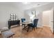 Stylish office space with hardwood floors, a desk, decor and striped chairs at 416 Katies Scenic Ct, Charleston, SC 29492