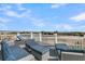 Outdoor deck features lounge seating with plush cushions and ocean views at 45 Ocean Point Dr, Isle of Palms, SC 29451