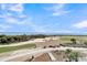 Stunning ocean view over the green golf course, sandy beach, and blue ocean water at 45 Ocean Point Dr, Isle of Palms, SC 29451